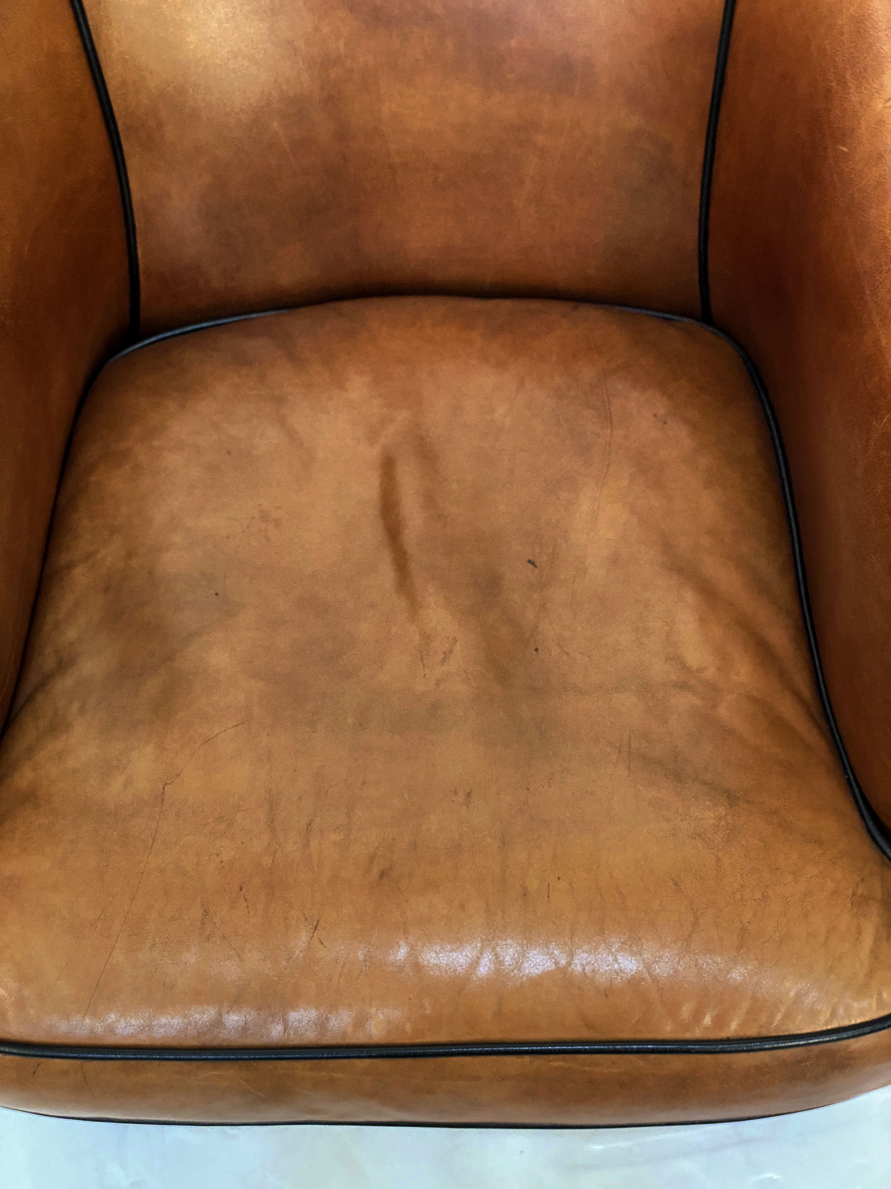 ff218_pair_of_leather_arm_chairs_60