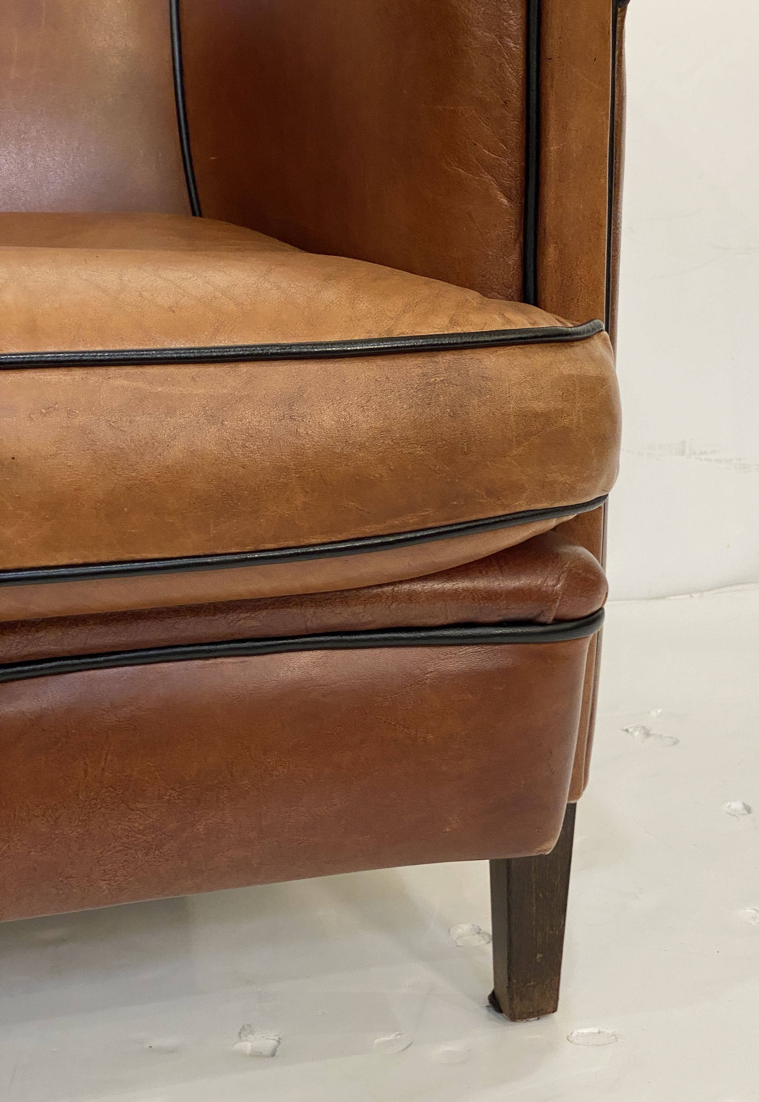 ff218_pair_of_leather_arm_chairs_65